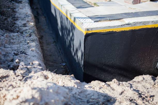 Professional Exterior Waterproofing technician working in Bethlehem, KY